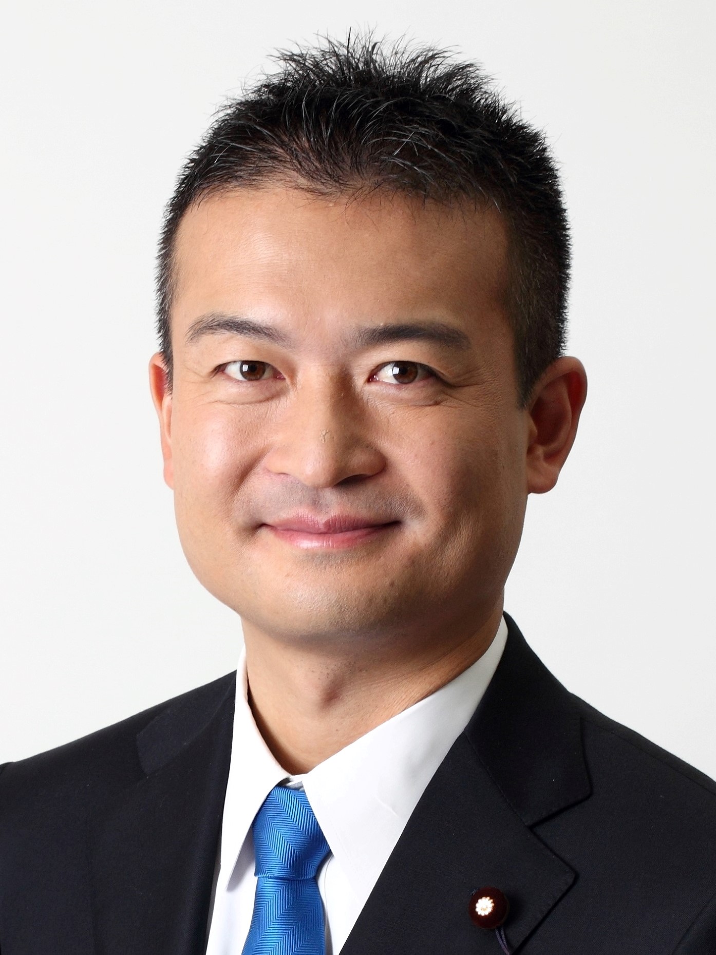 津村 啓介