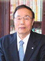 手仲 円容