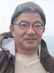 真造 賢二